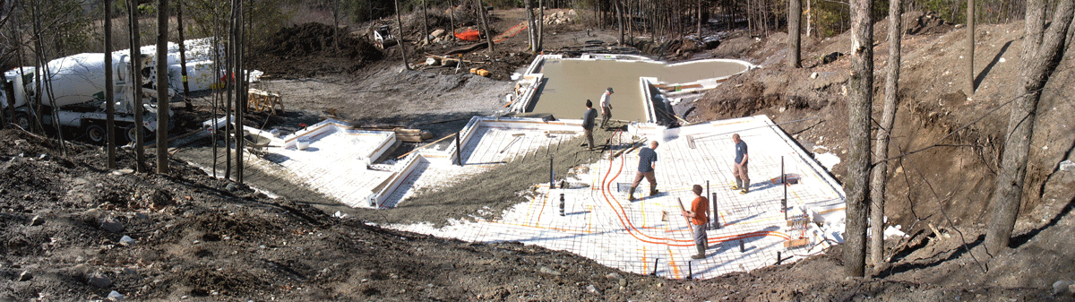 Pouring the concrete floor at River House - moorepartners.ca